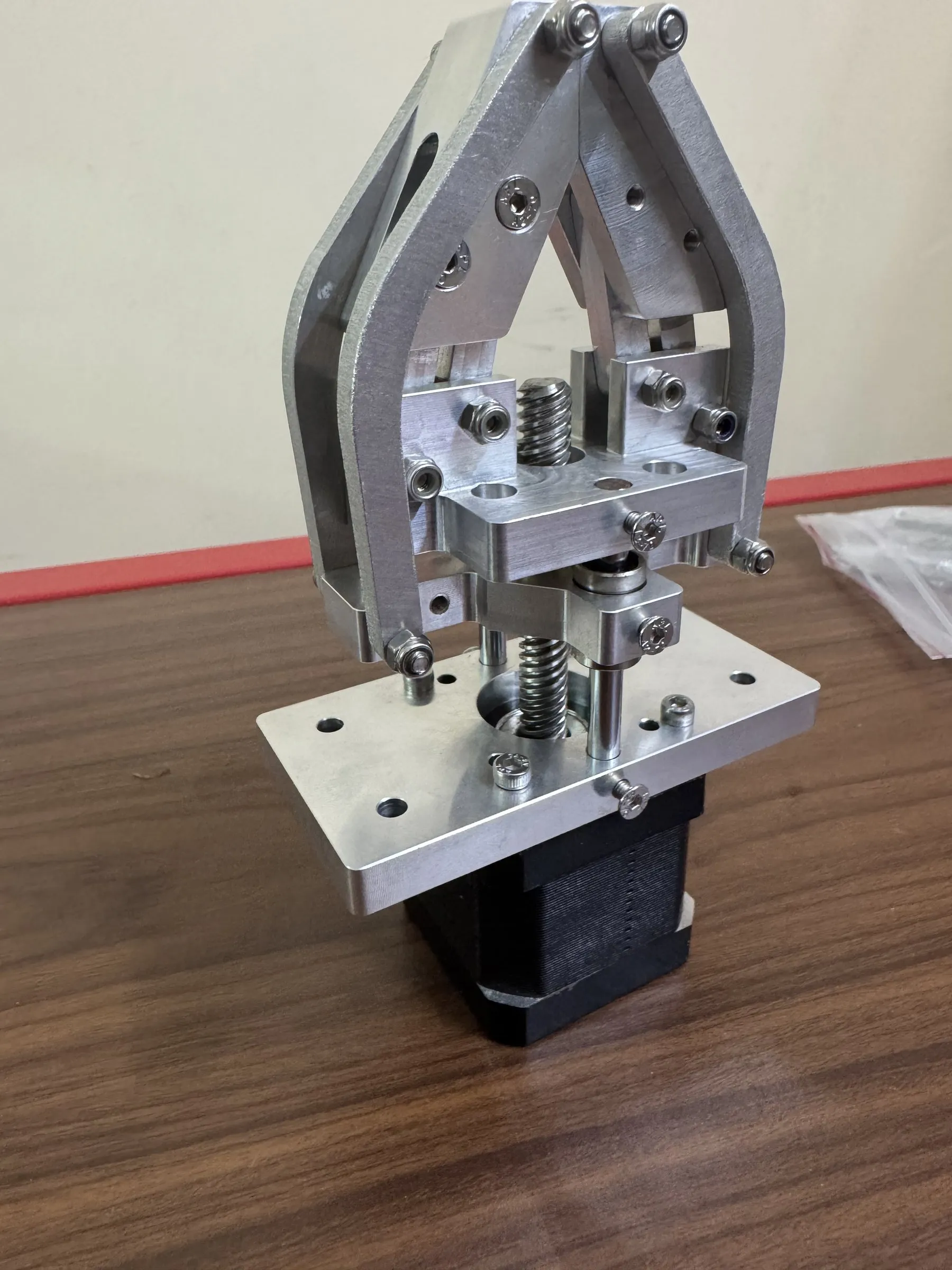 Aluminum parallel gripper with a lead screw, mounted on a stepper motor