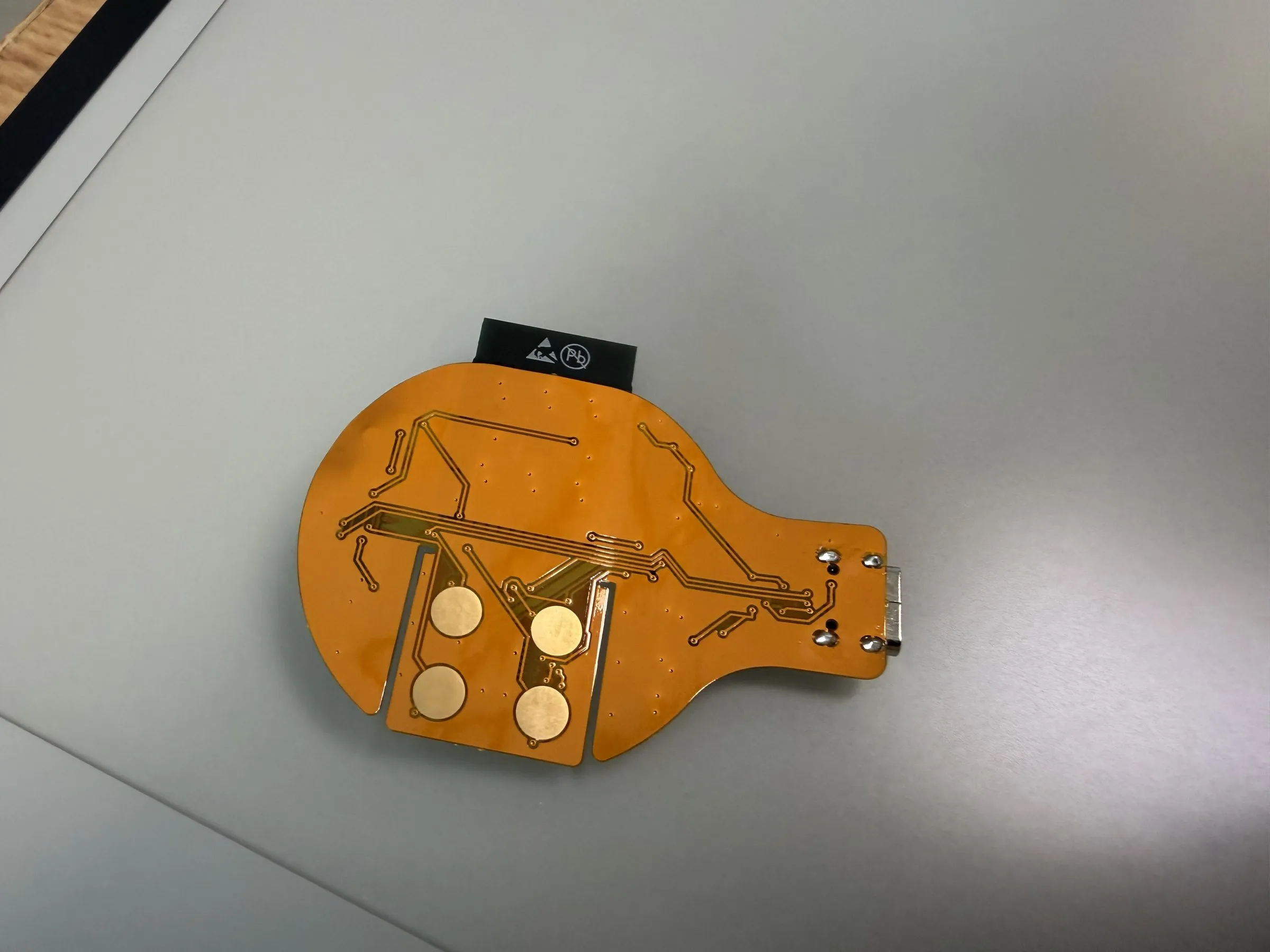 Flex PCB, electrode side with four gold skin-contact pads