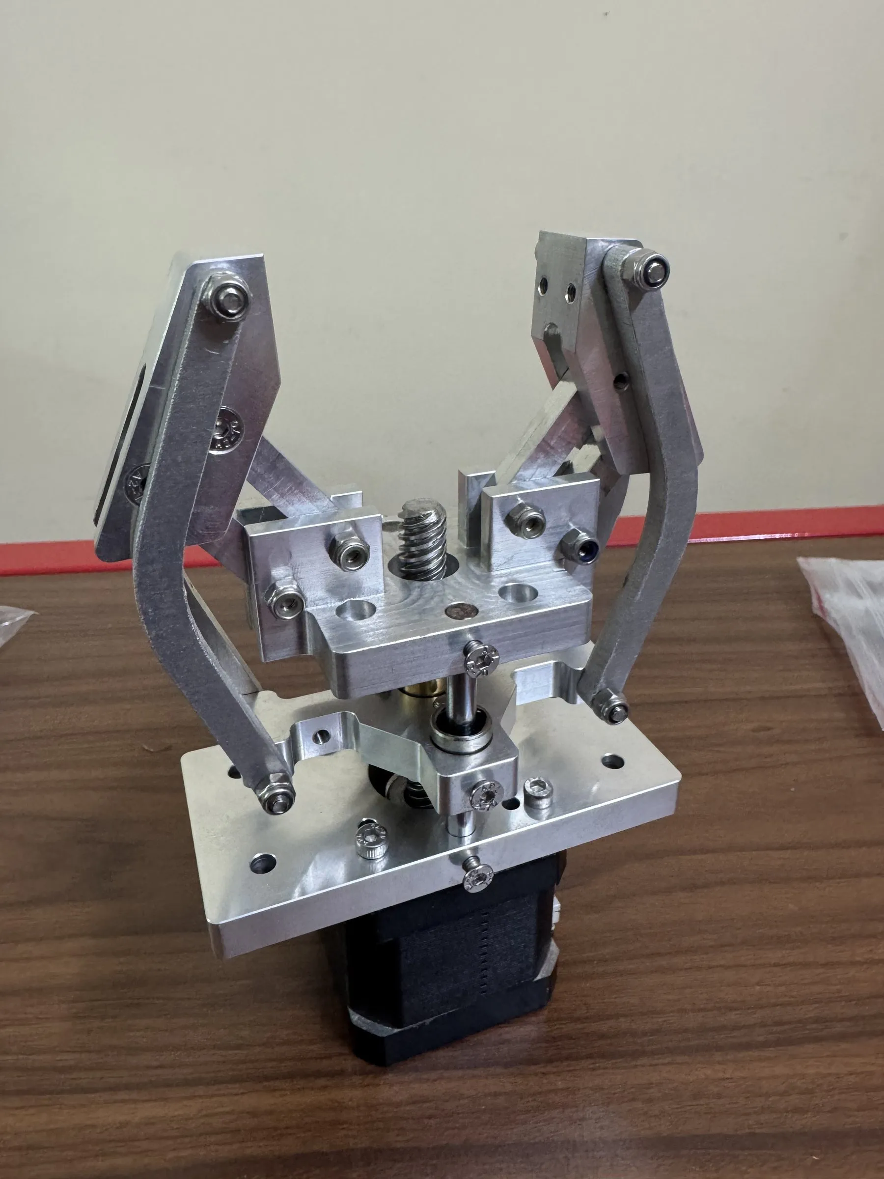 The gripper with its fingers open