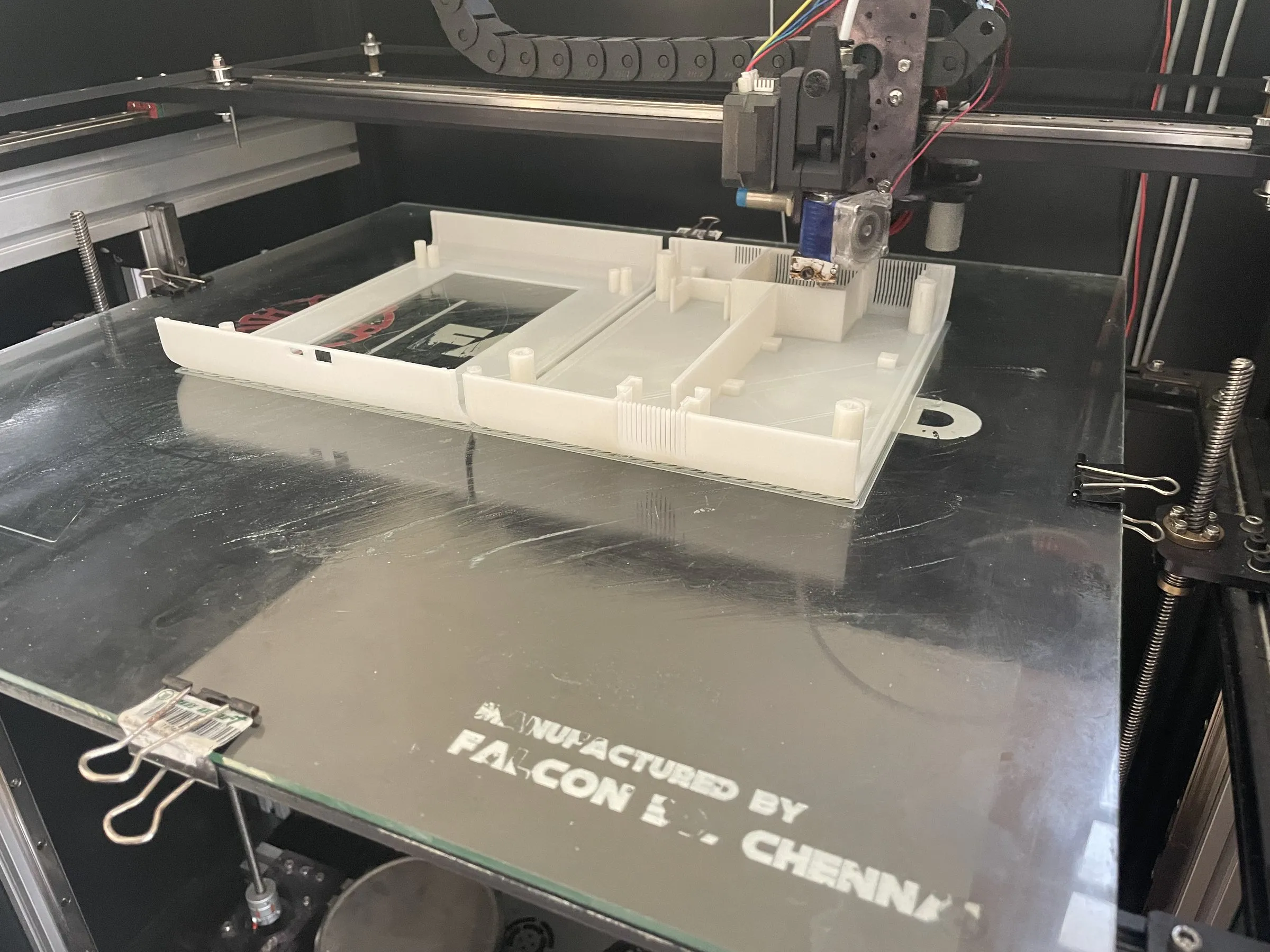 White parts printing on a glass bed