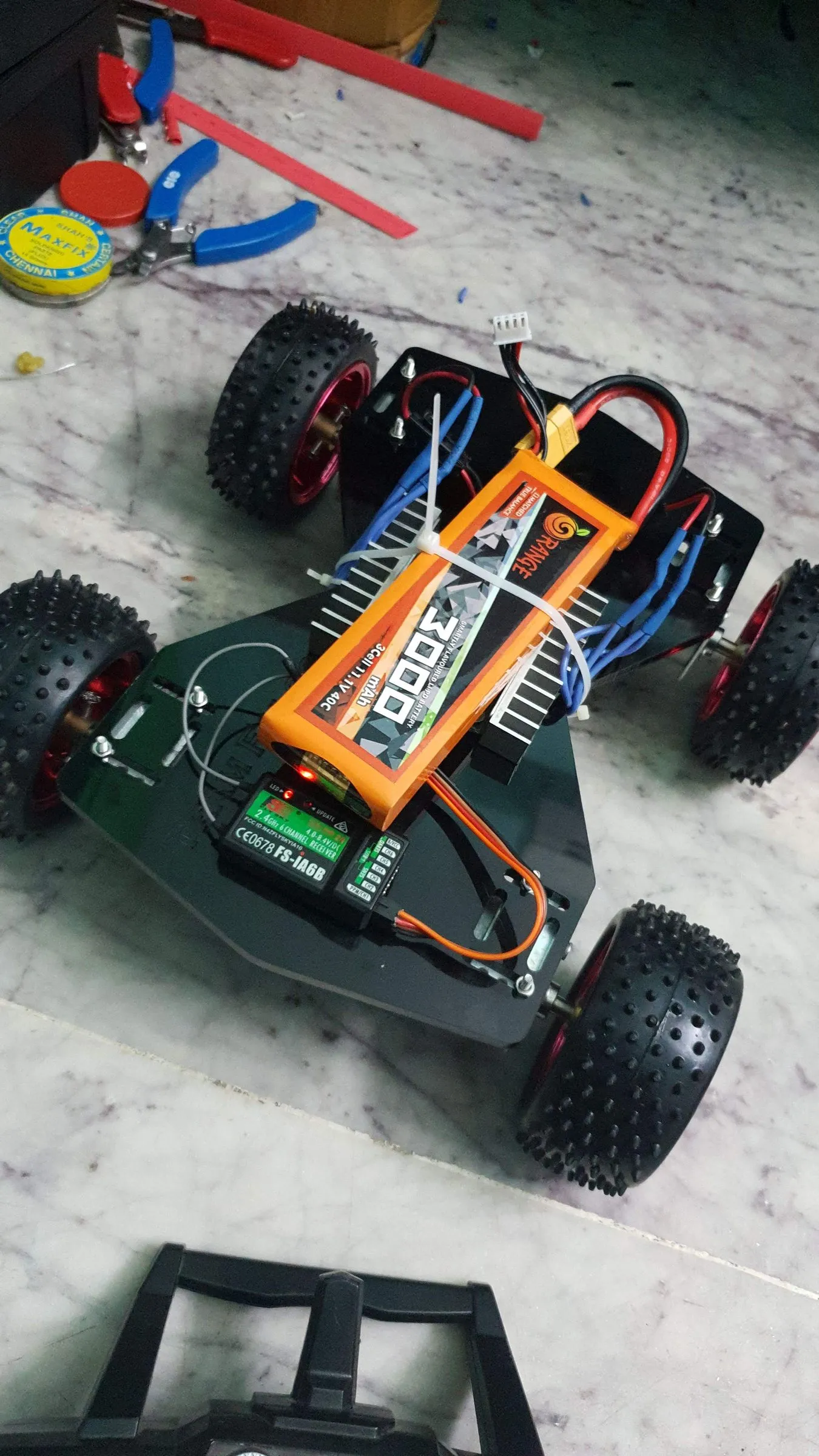 RC car chassis with electronics and battery